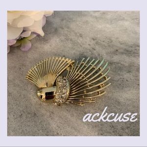 B.S.K. Vintage gold tone and rhinestone brooch